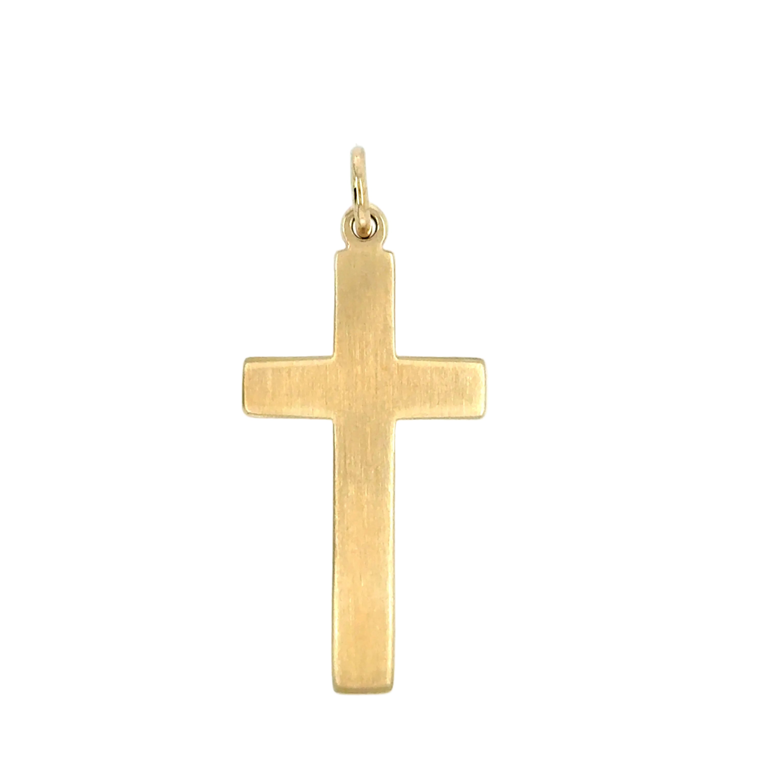 Gold cross pendant on a white background